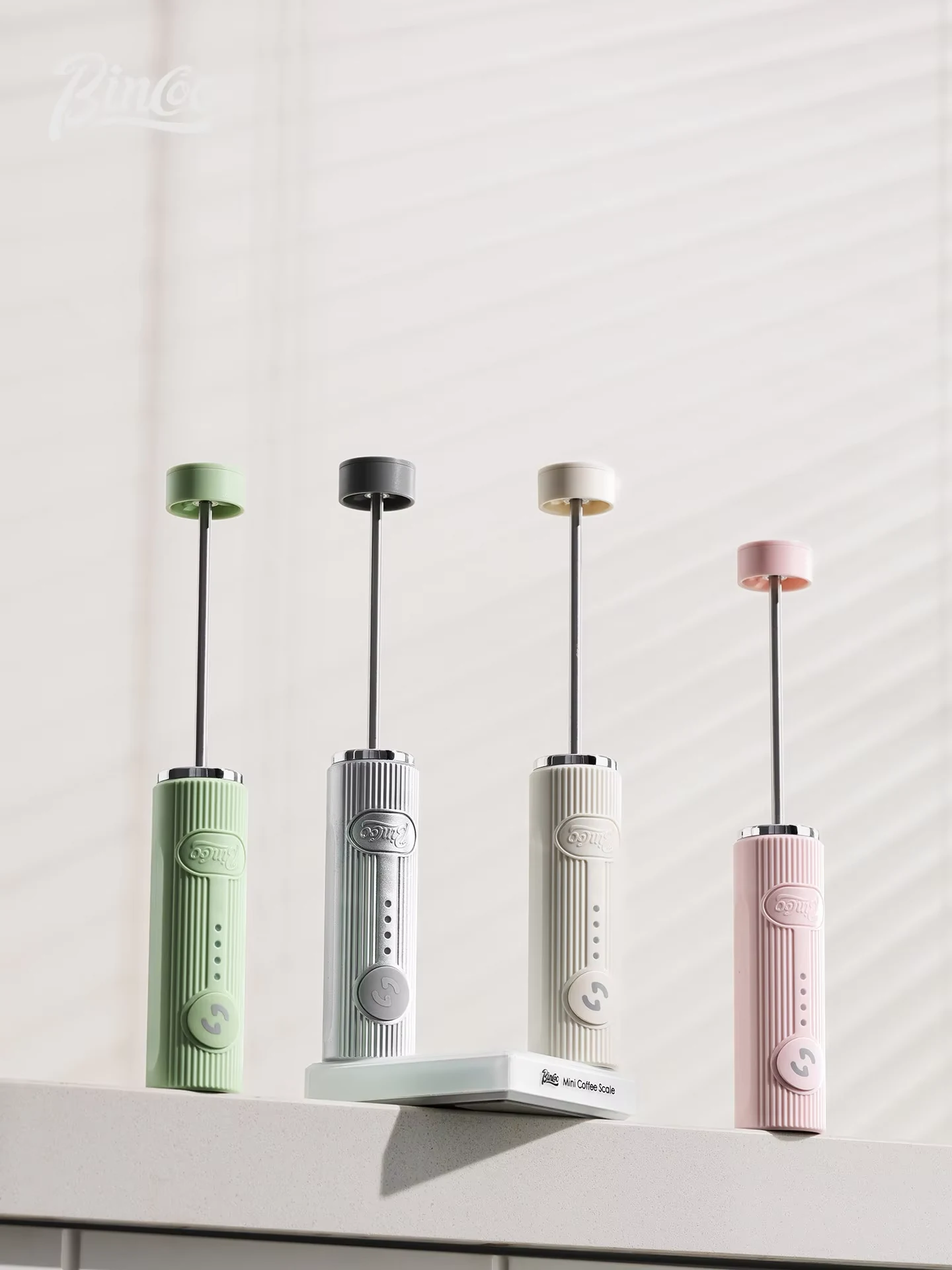 Seller photo showing Bincoo handheld milk frothers in several color options
